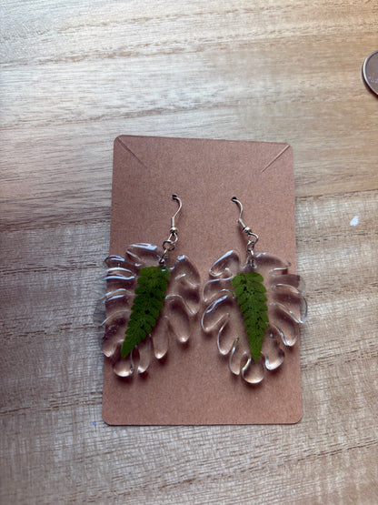 Ferns inside of monstera shape earrings